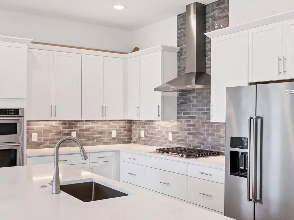 A modern model home kitchen at Gracewater at Sarasota
