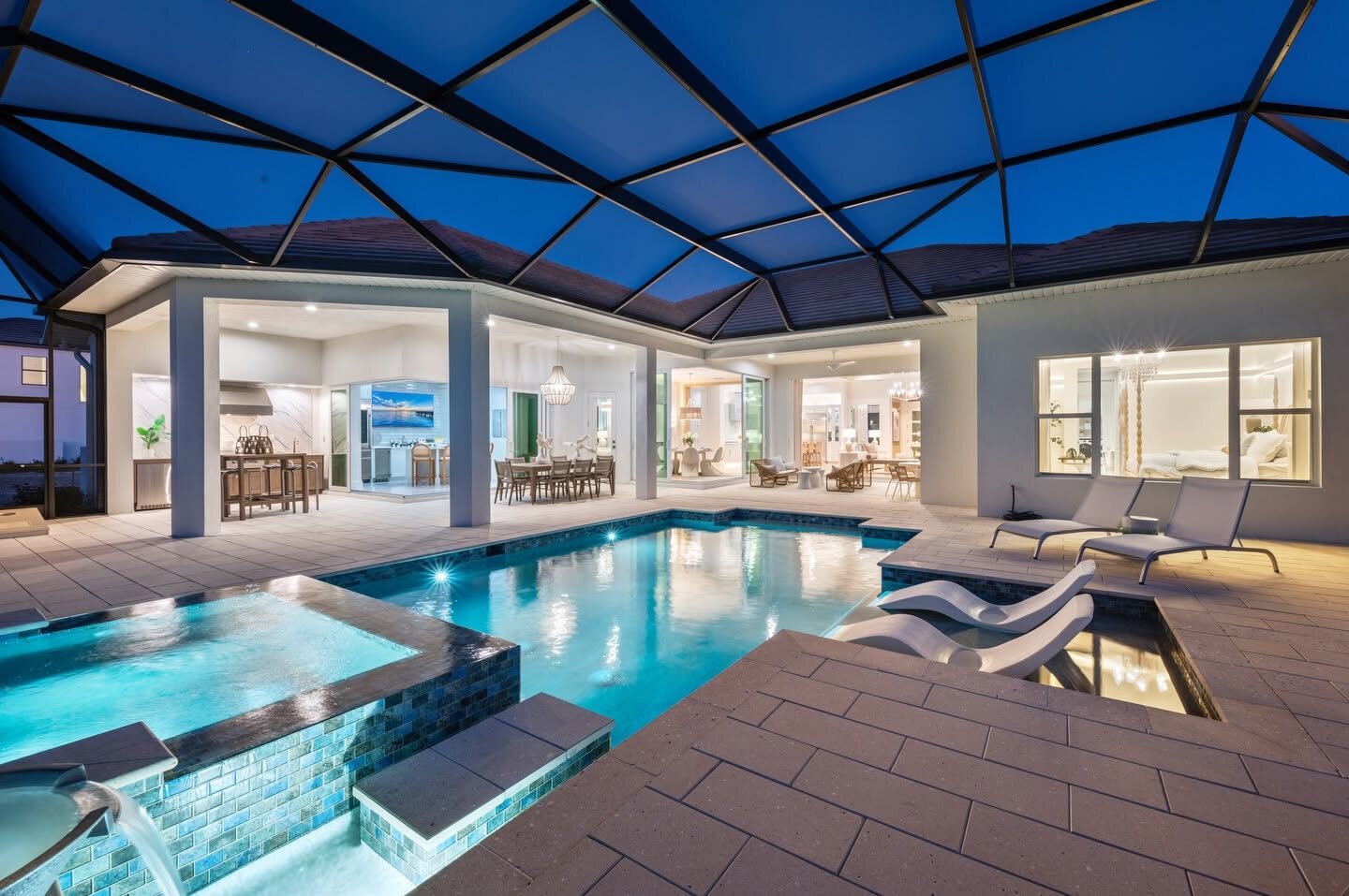 A screened lanai and pool at a Lee Wetherington custom home in Sarasota